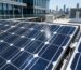 High-efficiency monocrystalline solar panels installed on a rooftop in Nigeria.
